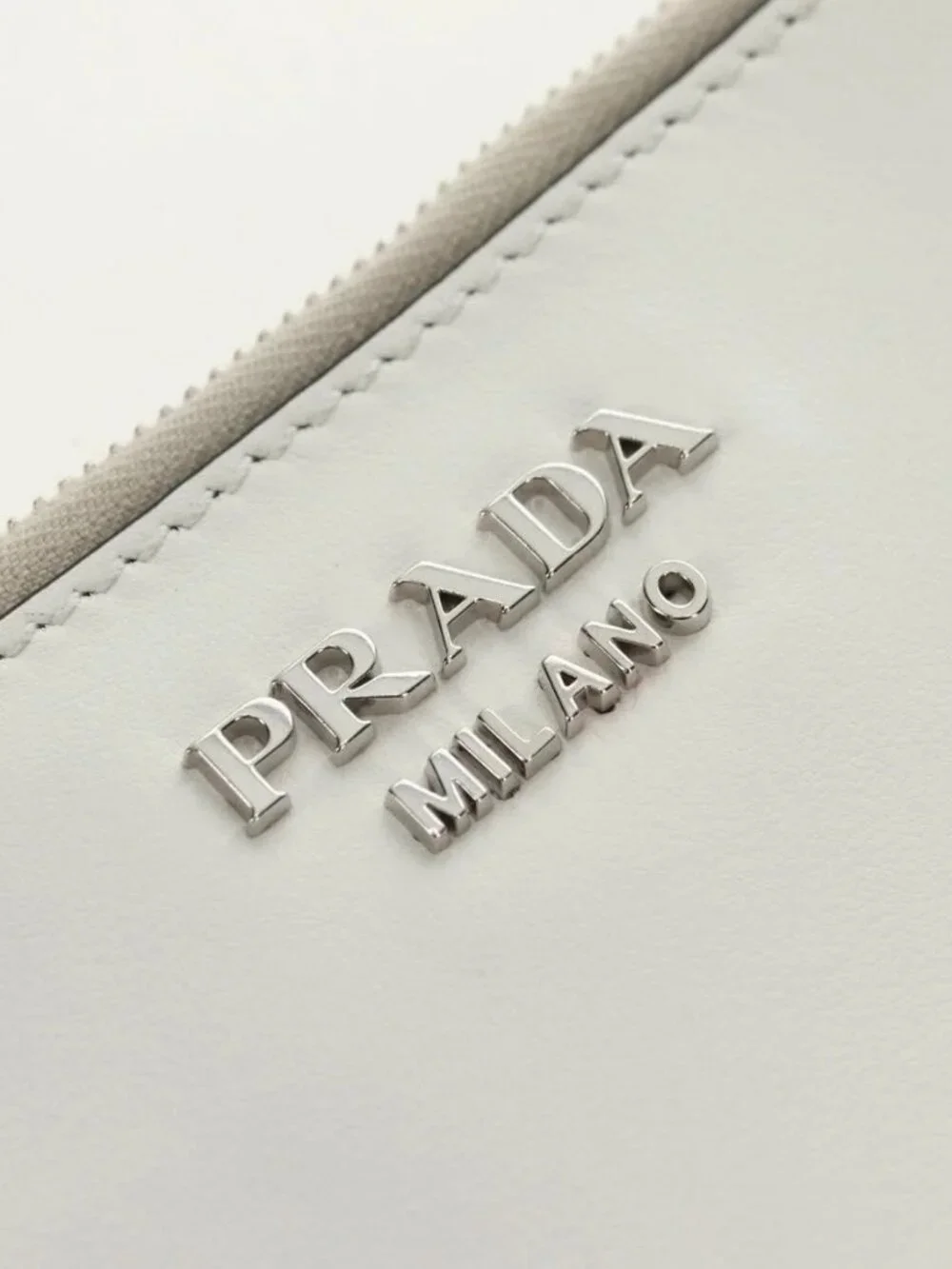Prada brand	prada color	white
